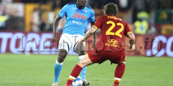 SSC Napoli's Senegalese defender Kalidou Koulibaly  challenges for the ball with Roma’s Italian forward Nicolo Zaniolo during the Serie A football match between AS Roma and SSC Napoli at the Olimpico Stadium Roma, centre Italy, on October 24, 2021.