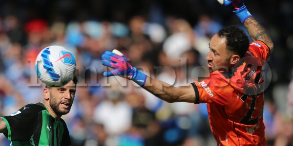 David Ospina challenges for the ball with Domenico Berardi during the Serie A football match between SSC Napoli and Sassuolo. Napoli won 6-1